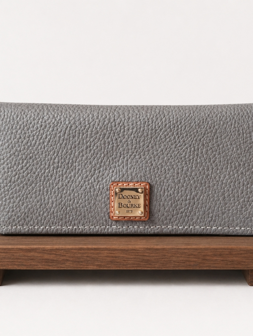 Dooney & Bourke Elephant  Gray Pebbled Leather Clutch with Gold Plaque Like New!